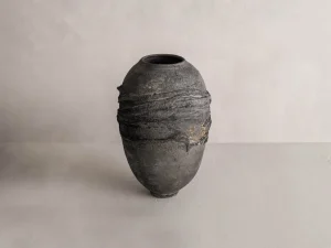 pottery vase, embodies raw earth textures, sculptural presence, handmade in a Paris atelier, artisan ceramic piece, handcrafted, perfect for collectors seeking unique ceramic home decor or French ceramic, natural, mineral soul
