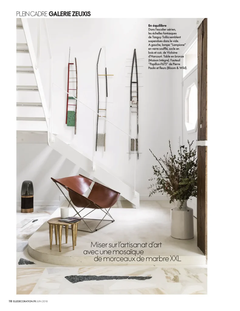 presse céramique contemporaine, création parisienne de la céramiste karen swami, exposée dans un intérieur design minimaliste, mettant en lumière l’esthétique épurée, l’art de vivre à la française avec des pièces en grès faites main