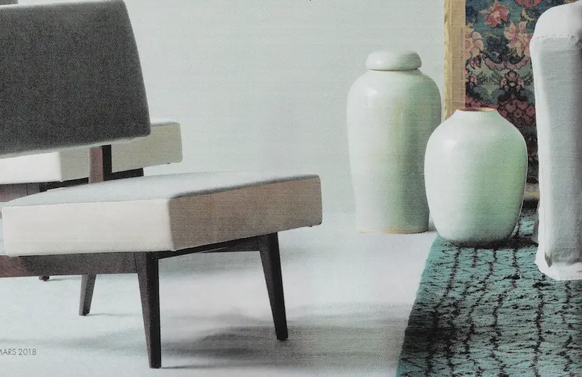 press contemporary ceramics, parisian creation with pure lines, illustrating the craftsmanship of integrated french art pottery, in a refined setting