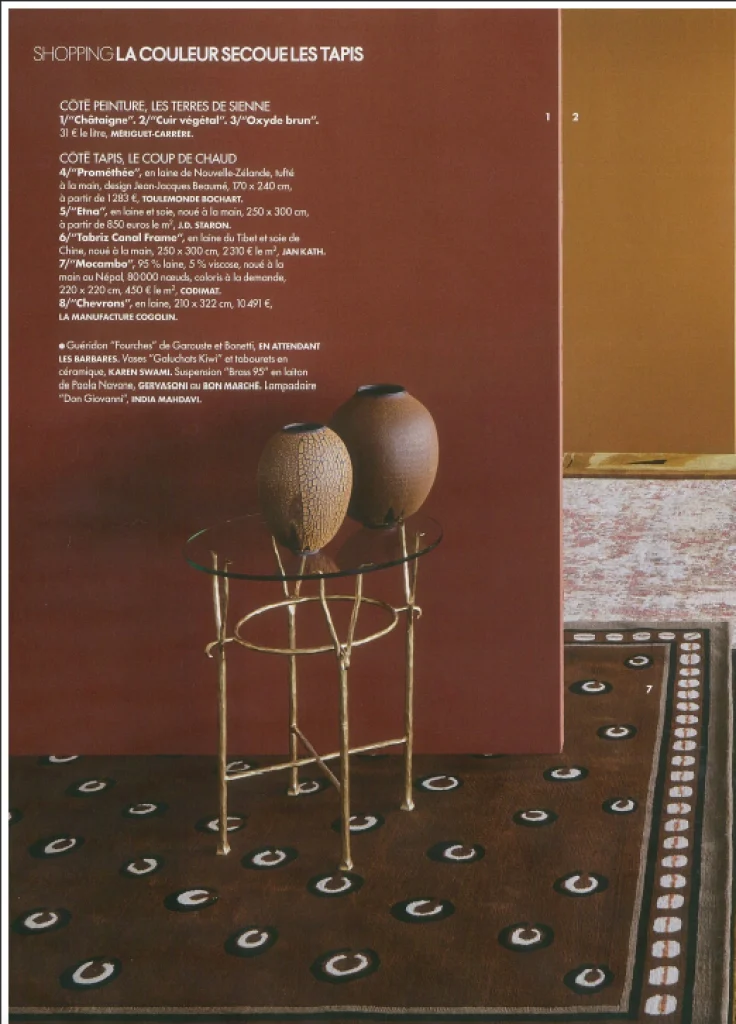 press art ceramics, patinated stoneware vases handmade by ceramist karen swami, integrated into a warm interior with earthy tones, between artisanal tradition and contemporary design