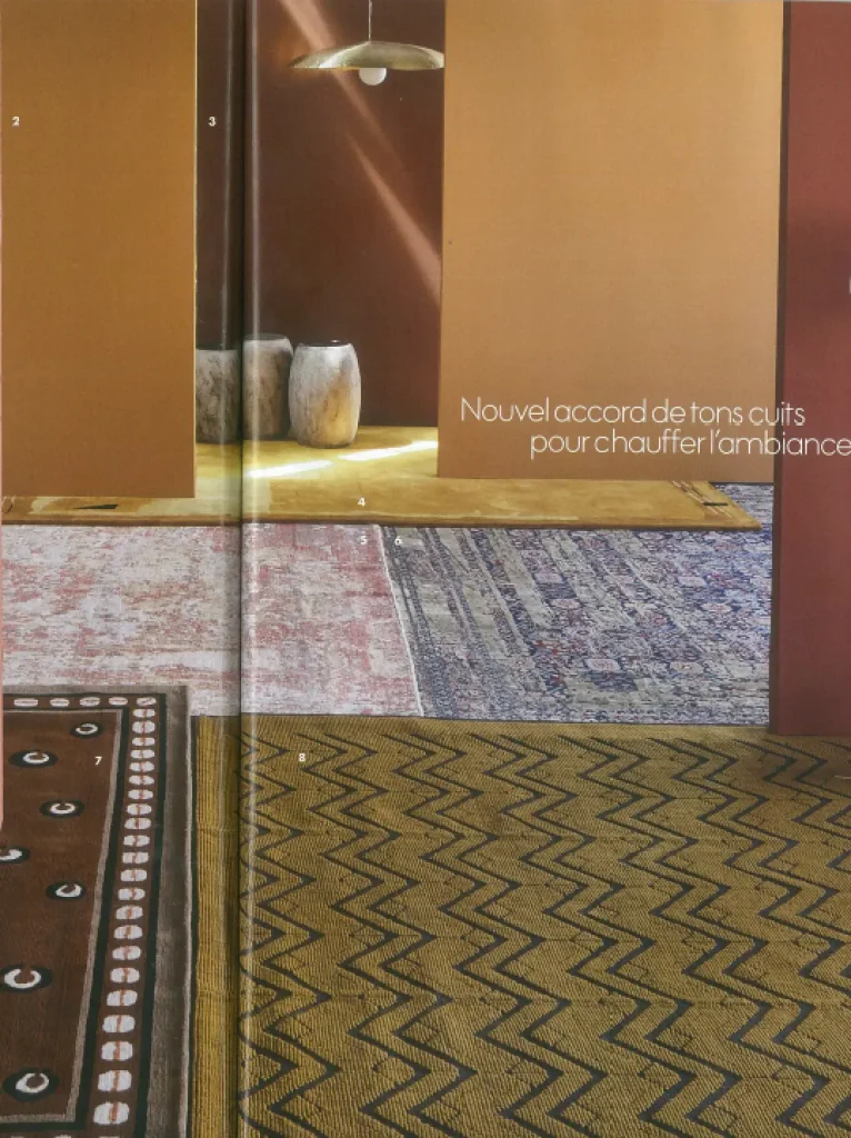 press art ceramics, patinated stoneware vases handmade by ceramist karen swami, integrated into a warm interior with earthy tones, between artisanal tradition and contemporary design